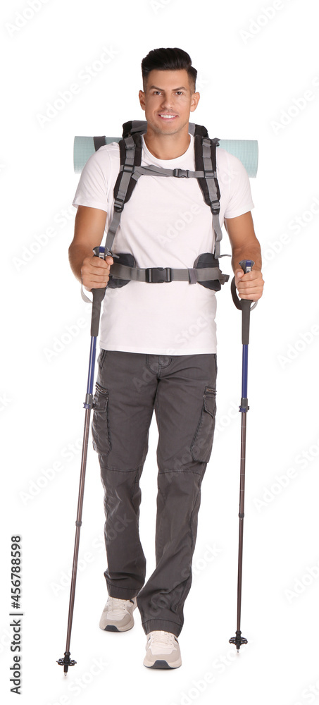 Male hiker with backpack and trekking poles on white background Male hiker with backpack and trekking poles on white background
