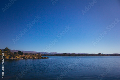 Panoramic winter view of beautiful mountain lake in San Luis, Argentina