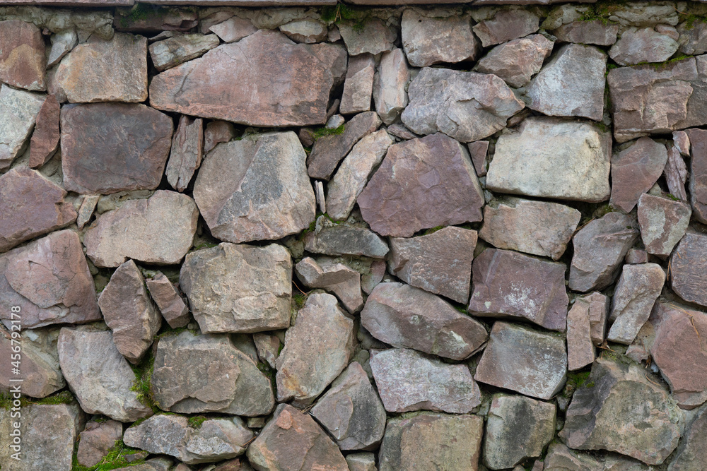 The background of the wall is made of natural stone. The background of the wall is made of natural stone.