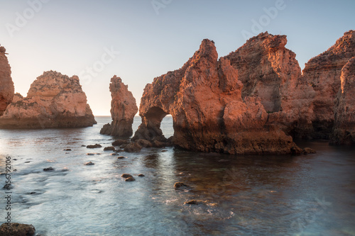 Sunny day in the Beach at Algarve, Portugal with turquoise sea in background. Bird eye view of the cliffs of Algarve. Aerial view. Concept for travel in Portugal and most beautiful places in Portugal. © Michal