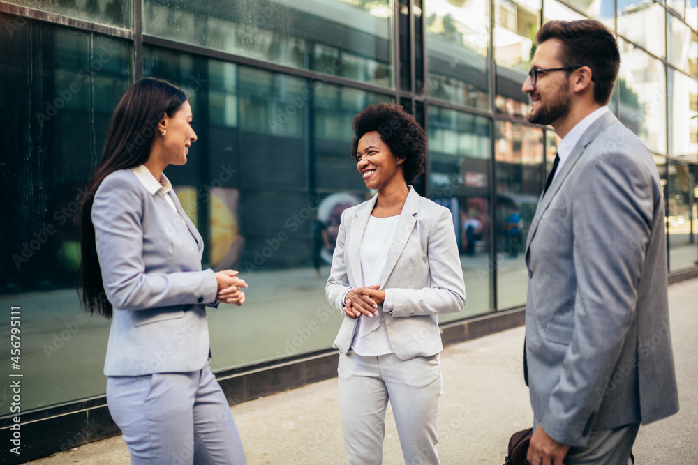 Group of business team meeting outside