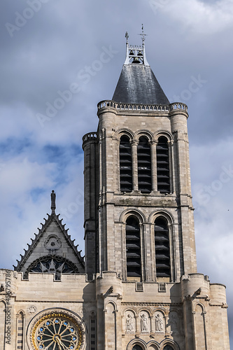 Facade of Basilica of Saint-Denis (Basilique royale de Saint-Denis, from 1144) - former medieval abbey church in city of Saint-Denis, a northern suburb of Paris. France.