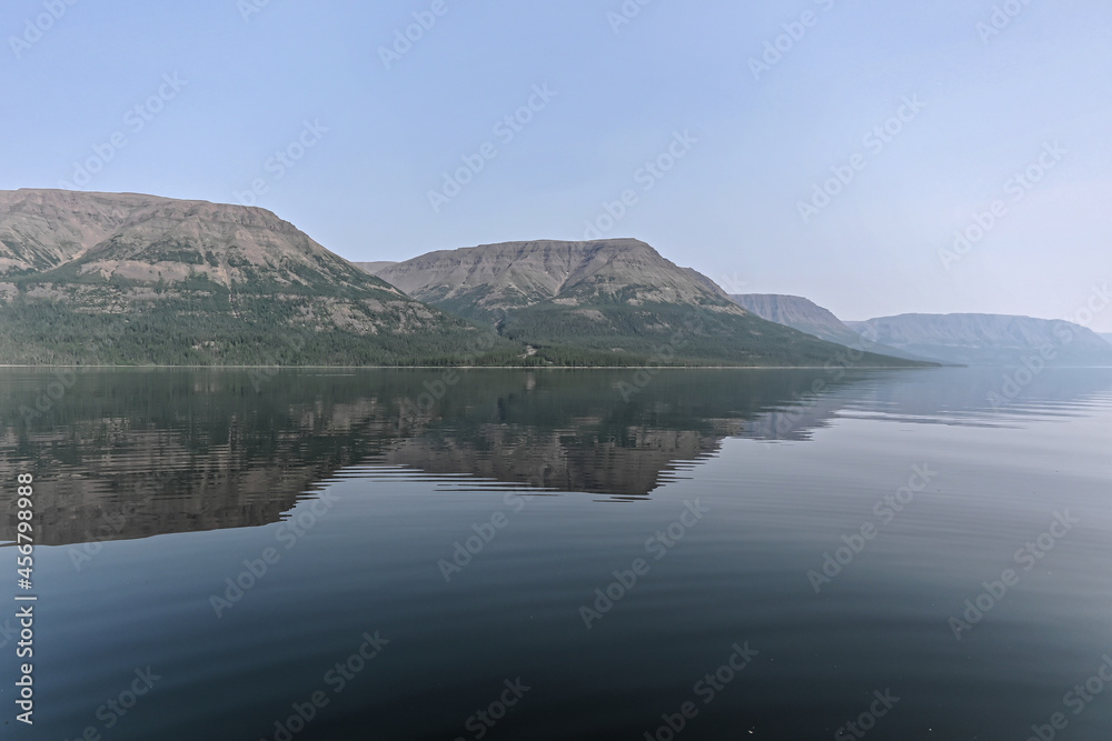 Putorana Plateau, a misty haze over the lake. Putorana Plateau, a misty haze over the lake.