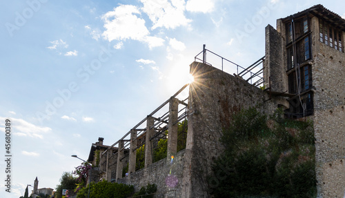 Lemon greenhouse in Gargnano on Lake Garda backlit with sun rays