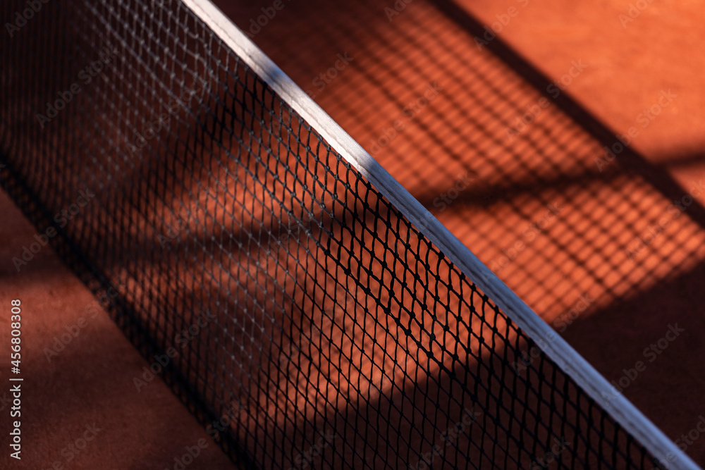 Orange tennis court net with shadows. Horizontal sport poster, greeting cards, headers, website