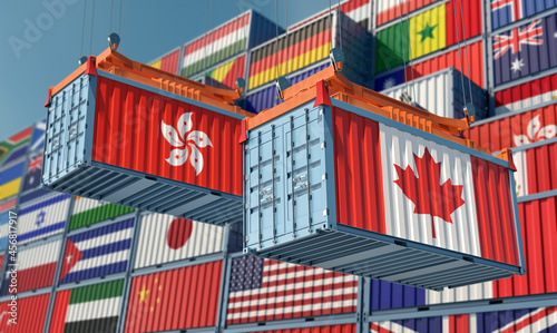 Freight containers with Canada and Hong Kong national flags. 3D Rendering © Marius Faust