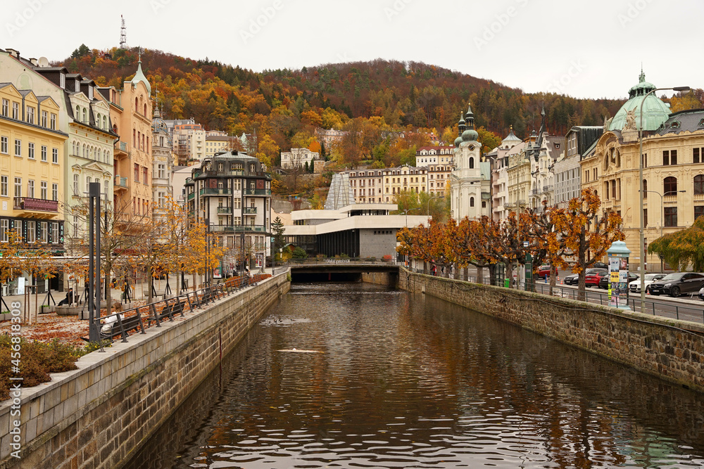Historic spa town Karlovy Vary, famous for geothermal hot springs used for treatment and Vridlo geyser, autumn season