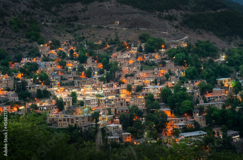 Masuleh at sunset , also Romanized as Masoleh and Masouleh is a village in the Sardar e Jangal District, in Fuman County, Gilan Province, Iran. photo