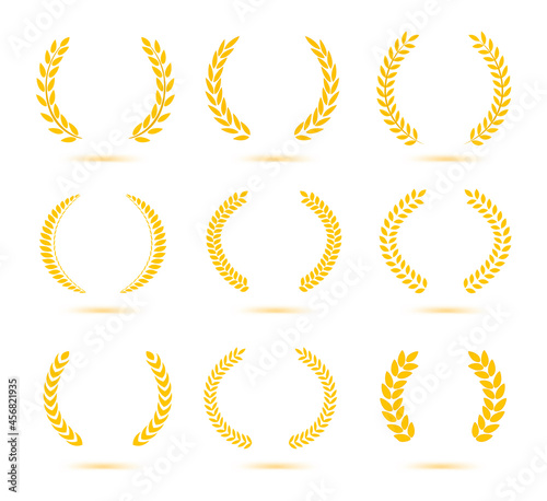 Set of gold laurel wreaths isolated on white background. Vector illustration ready and simple to use for your design.	