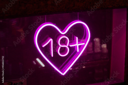 sex love shop neon sign showcase window glowing
