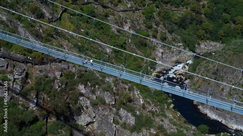 AROUCA, PORTUGAL - May 01, 2021: A breathtaking view of the world longest pedestrian suspended bridge in Portugal photo