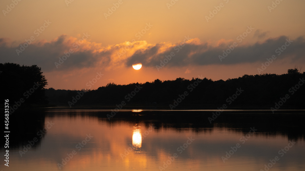 Fototapeta premium Amazing clouds and sunrises caught in the Pocono Mountains of PA