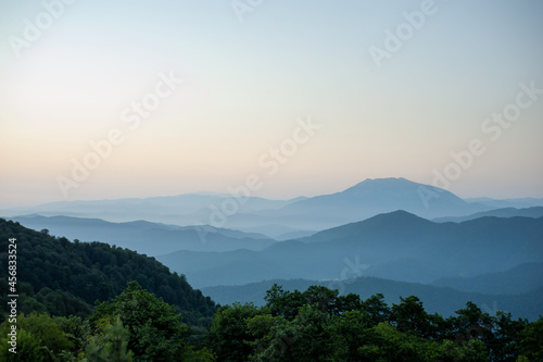 the view from Beech forest from top of the mountain at sunset, gilan province, iran, the layers of mountains
