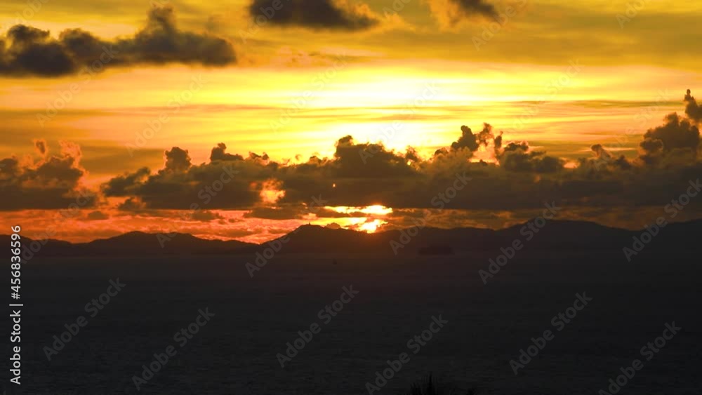 A Beautiful Sunset Over Phuket Island from Koh Phi Phi Scenic Viewpoint in Thailand. A Beautiful Sunset Over Phuket Island from Koh Phi Phi Scenic Viewpoint in Thailand.