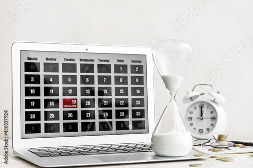 Hourglass, alarm clock and ...