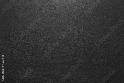 Dark black color old grunge wall concrete texture as background.