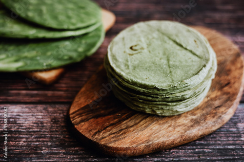 Mexican tortillas made with nopales in color green healthy vegan and organic food in Mexico photo