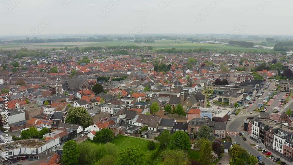 Aerial fast orbit over the Axel city center in the Netherlands shot on a cloudy day Aerial fast orbit over the Axel city center in the Netherlands shot on a cloudy day