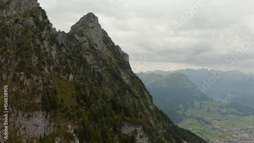 Speedramping drone shot over a mountain ridge in Switzerland photo