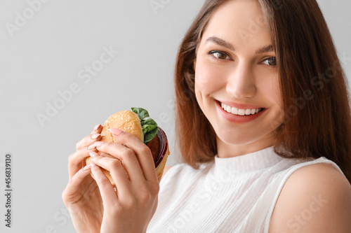 Beautiful young woman with ...