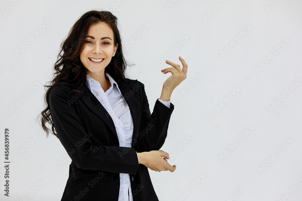 Portrait studio shot of Caucasian confused doubtful clueless curious businesswoman in black formal suit standing look at camera on white background Portrait studio shot of Caucasian confused doubtful clueless curious businesswoman in black formal suit standing look at camera on white background