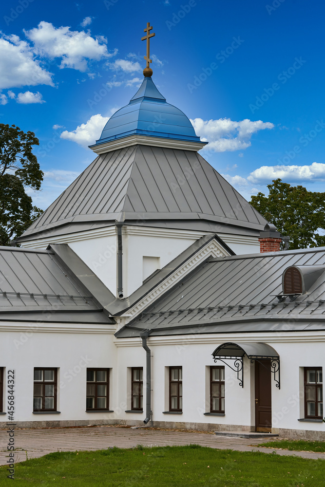 Fragment of the bell tower of a Christian church with a blue roof Fragment of the bell tower of a Christian church with a blue roof