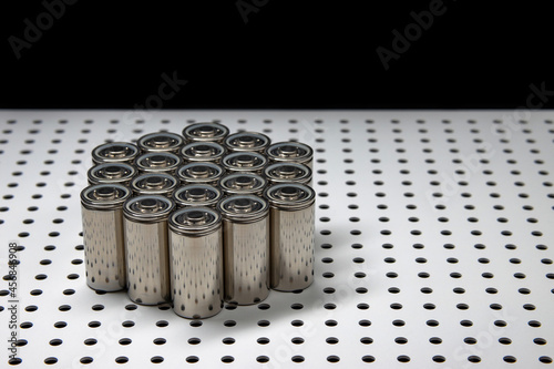 New modern Li-polymer batteries with increased capacity. A prototype of new batteries on a laboratory table.