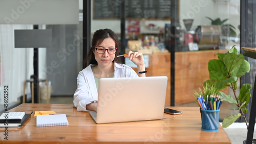 Successful businesswoman working with laptop computer.