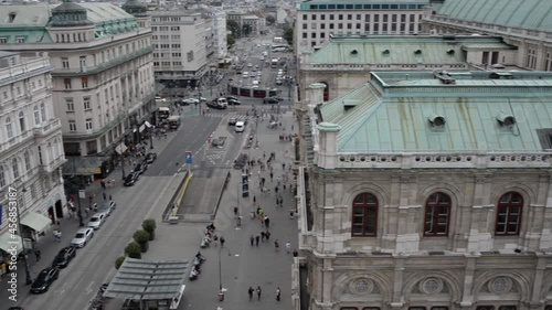 Vienna State Opera roof in Vienna seen from above with unidentified passers-by photo