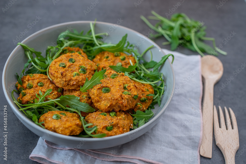 Fototapeta premium Homemade fried sweet potato cakes on a plate