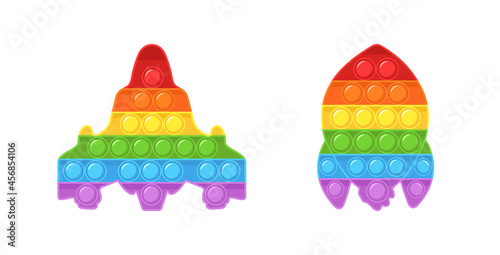 Pop it fidget. Set of trendy sensory playthings. Rocket shaped antistress children game. Colorful hand toy with push bubbles. Vector illustration in flat cartoon style.