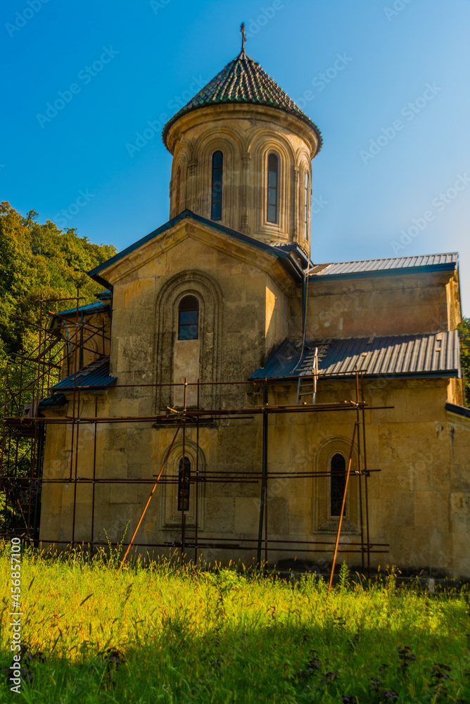 KUTAISI, GEORGIA: Church in the name of St. George the Victorious in Gelati monastery on a sunny summer day. KUTAISI, GEORGIA: Church in the name of St. George the Victorious in Gelati monastery on a sunny summer day.