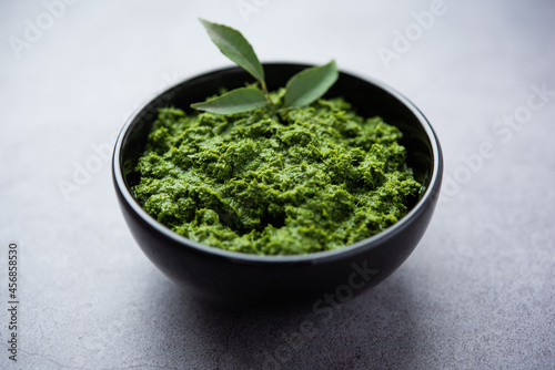 curry leaves or kadi patta chutney in a bowl