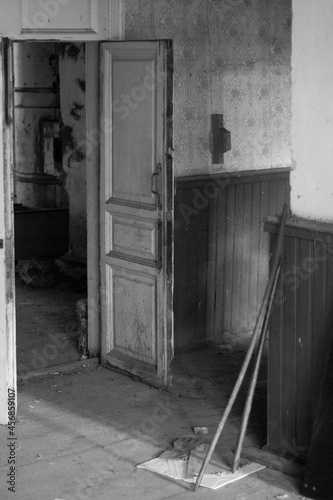 corridor of old abandoned wooden rural hospital in black and white © андрей юзов
