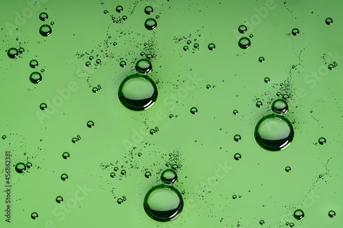 Liquid serum, gel bubbles background.
