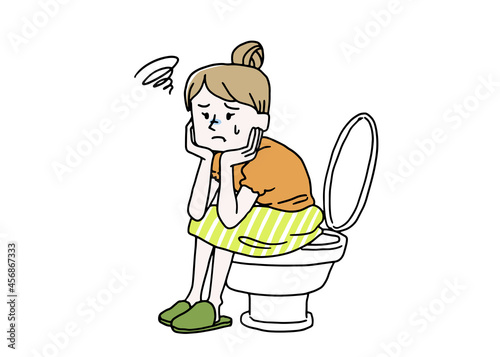 トイレで落ち込んでいる女性