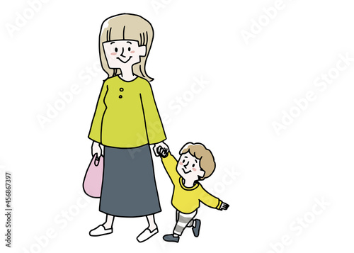 子供と手を繋いでいる妊娠している女性
