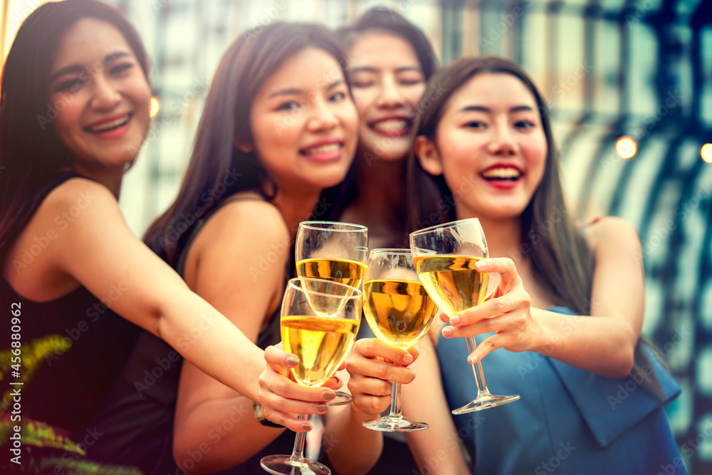Party time start. Happy people toasting with champagne flutes. Multiethnic friends congratulating each other with new year. Celebration holiday concept, holiday background. selective focus
