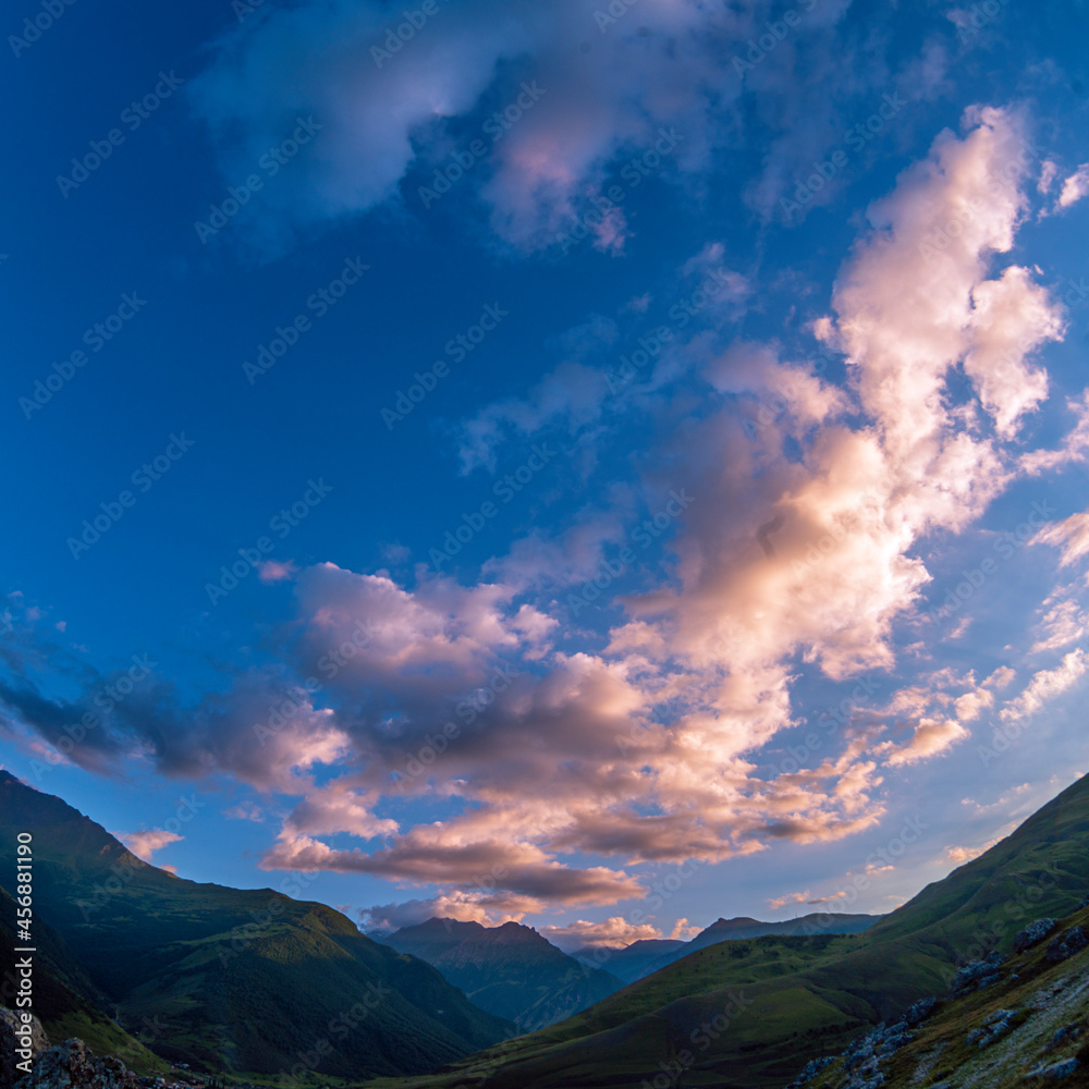 Mountains of North Ossetia, beautiful summer landscapes with blue sky and clouds.