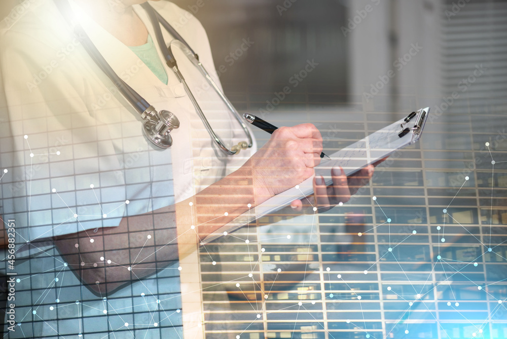 Female doctor taking notes on clipboard; multiple exposure