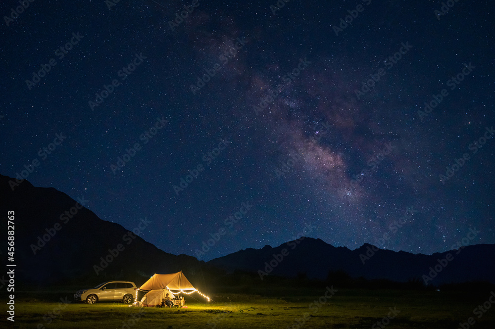 Tent under the stars at night