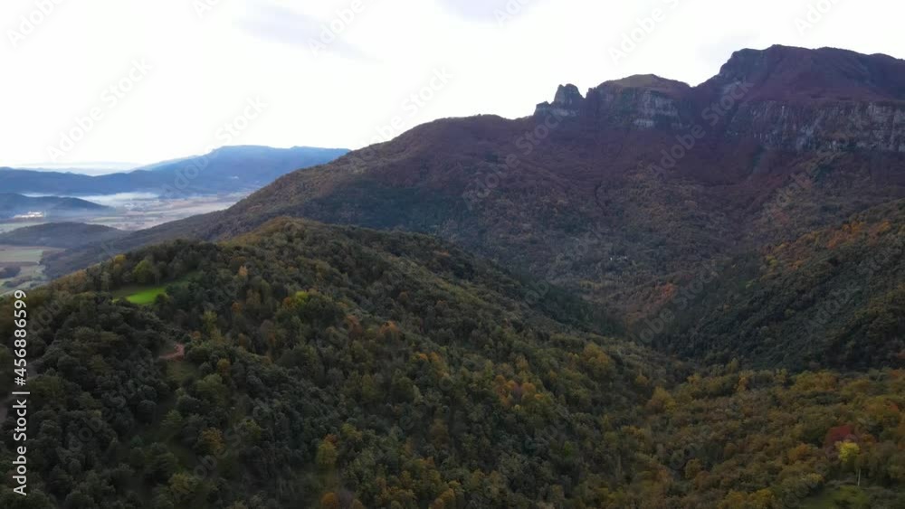 Aerial scene with drone of the autumn landscape in Puigsacalm Peak, La Garrotxa, Girona, Spain. 4K UHD Aerial scene with drone of the autumn landscape in Puigsacalm Peak, La Garrotxa, Girona, Spain. 4K UHD