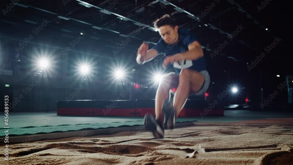 Long Jump Championship: Professional Male Athlete Running on Track and ...