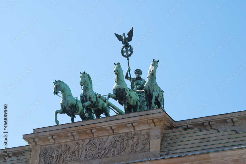 Close-up of the angel and chariot bronze statue on top of the Brandenburg Gate in Berlin