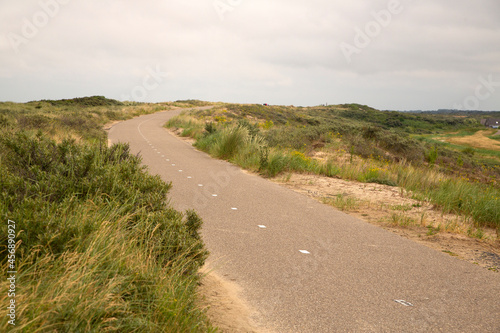 Cycling way on top of sand dunes, Ouddorp, Goeree-Overflakkee, South Holland, Netherlands