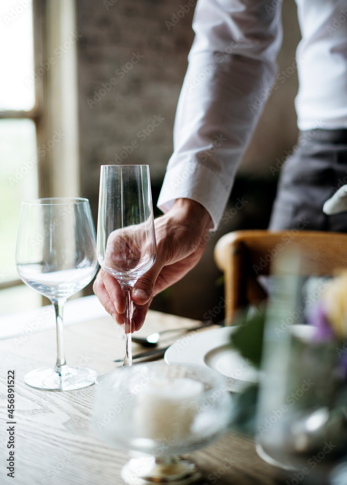 Restaurant Staff Setting Table in Restaurant for Reception