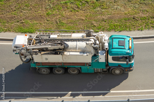 Truck with tank for pumping waste or contaminated water.