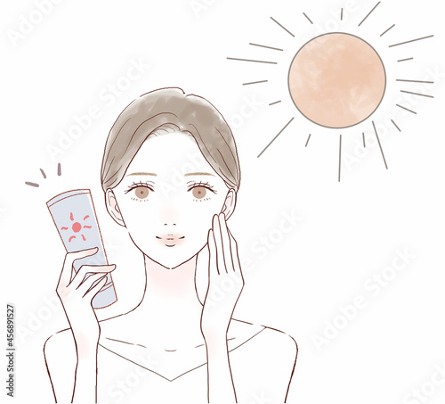 日焼け止めを塗って、紫外線対策をする女性