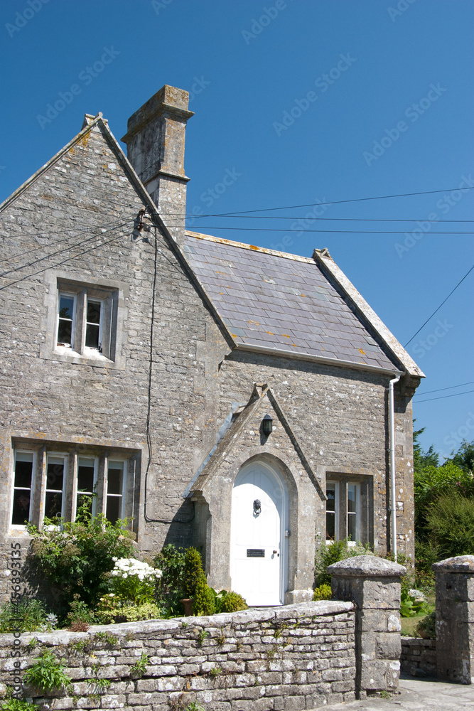 An attractive Purbeck stone house in the village of Kingston in Dorset An attractive Purbeck stone house in the village of Kingston in Dorset
