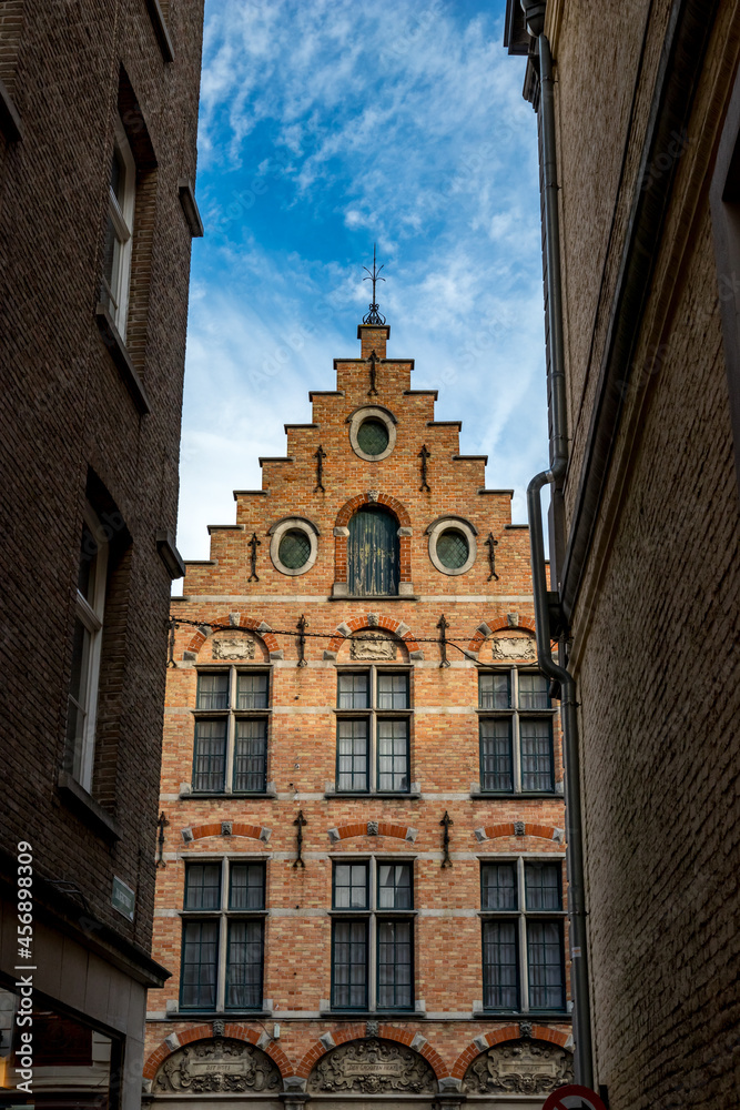 Façade of an old building, street view, Bruges, Belgium